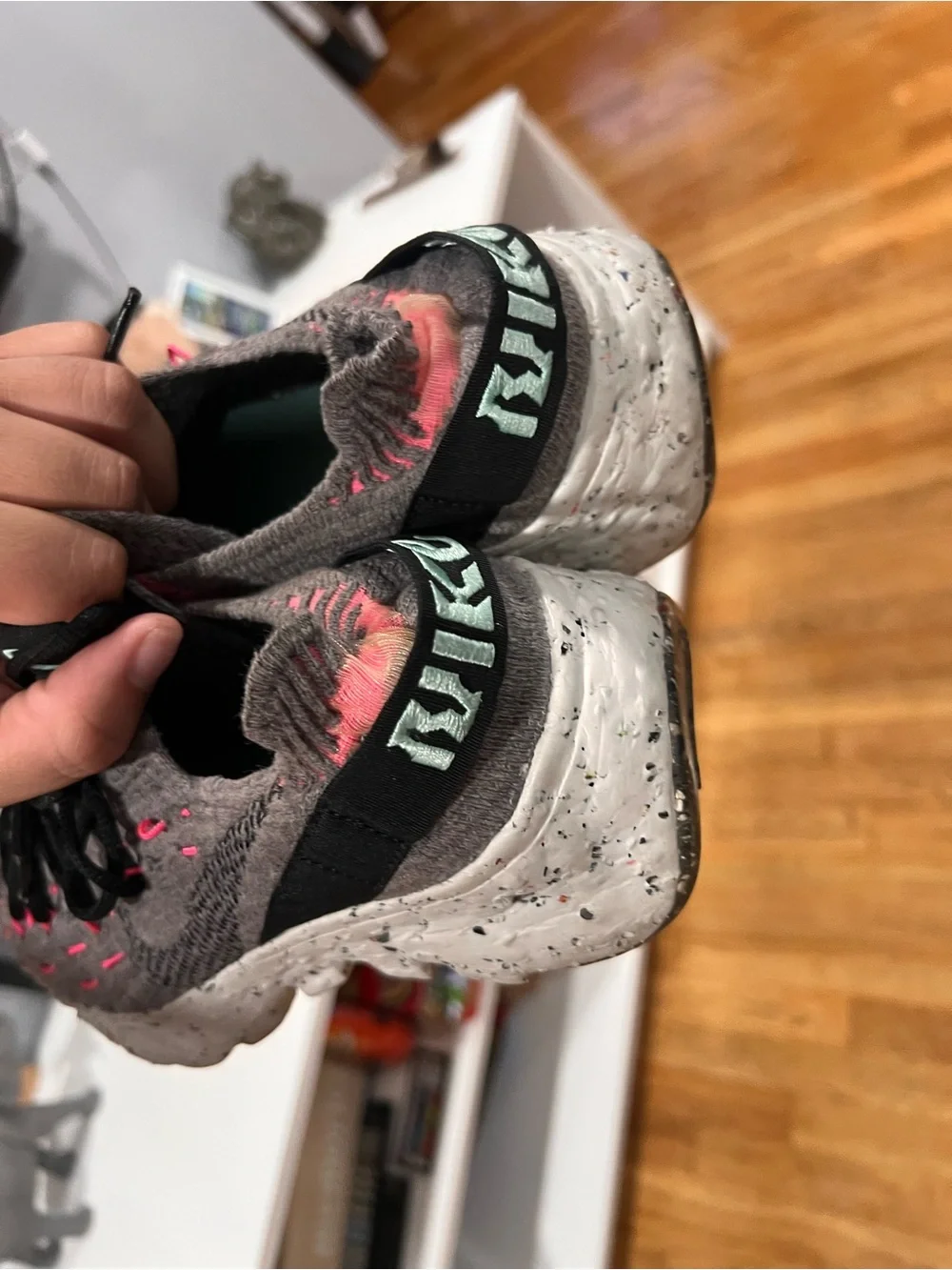 Nike Women's Gray Knit Sneakers with Pink Highlights